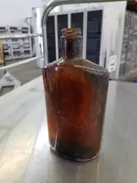 Image of Antique Brown Glass Flask