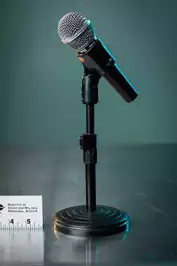 Image of Silver Handheld Microphone On Stand