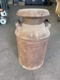 Image of Rusted Antique Milk Can