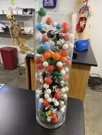 Image of Molecule Models W/ Glass Tower