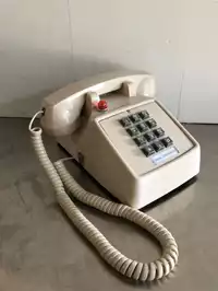 Image of Cream Color Operator Phone