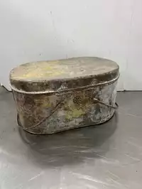 Image of Antique Metal Rusted Container