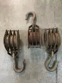 Image of Aged Metal Three Slot Pulley