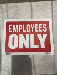 Image of Red Employees Only Sign