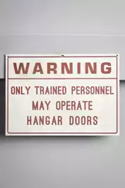Image of Warning Only Trained Personnel Signage