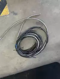 Image of Harness Of Black Wire With Flex Conduit