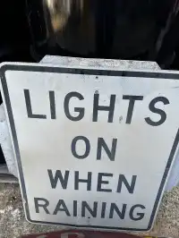 Image of Lights On When Raining Sign