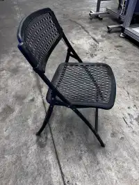 Image of Black Mesh Plastic Chair