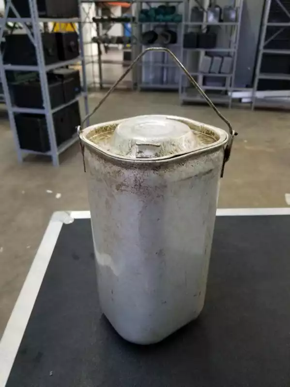 Image of Aged Aluminum Container