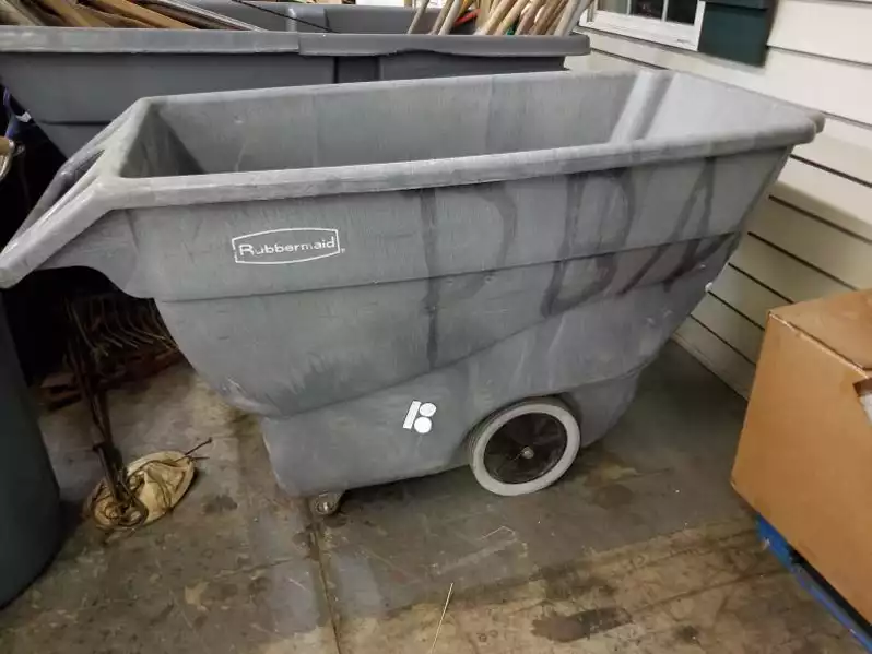 Image of Gray Rubbermaid Rolling Dumpster