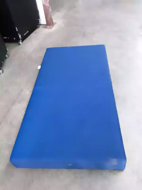 Image of Blue Plastic Covered Mattress